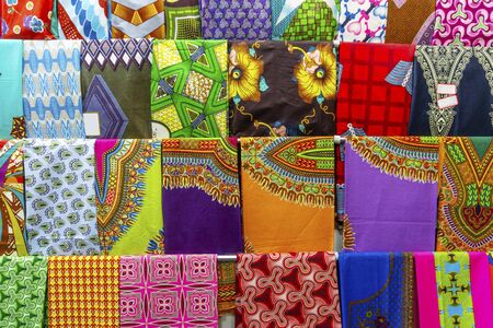 Plenty of colorful African fabrics in a rows, Maputo, Mozambique