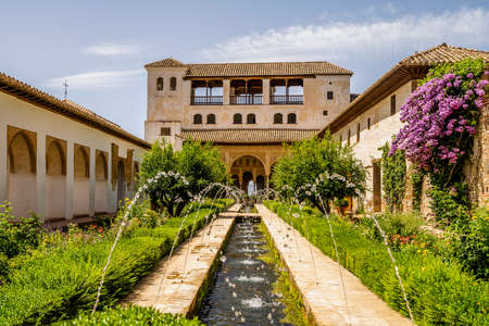 Generalife Moorish palace with green courtyard in Alhambra, Granada, Spainのeditorial素材