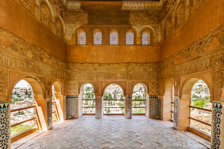 Moorish portico with an Arabic ornaments and amazing view on the city is part of El Partal in Alhambra palaces, Granada, Andalusia, Spainのeditorial素材