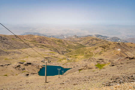 Cable car from ski resort Sierra Nevada through Sierra Nevada National Park, Andalusia, Spain