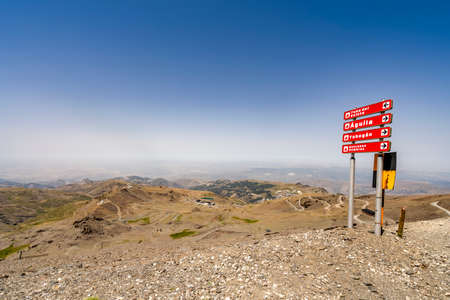 Information sign with names of the peaks on the way to Tubo del Veleta, Sierra Nevada National Park,...
