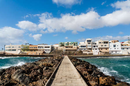 Pozo Izquierdo overlook with breakwater with pedestrian sidewalk, Gran Canaria, Canary Islands,...