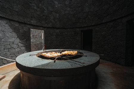 Tasty meat barbecued on volcanic heat, Timanfaya National Park, Canary Islands, Spainの写真素材