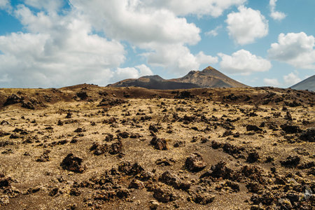 Amazing volcanic landscape with lava fields in Timanfaya National Park, Lanzarote, Canary Island, Spainの写真素材