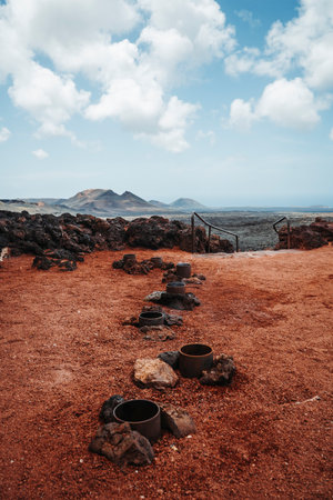 Holes in the ground used for volcano's show, Timanfaya National Park, Canary Islands, Spainの写真素材
