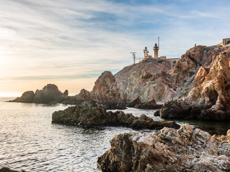 Beautiful Gata Cape landscape with rock formations in the water during sunset, Almeria, Andalucia, Spainの写真素材