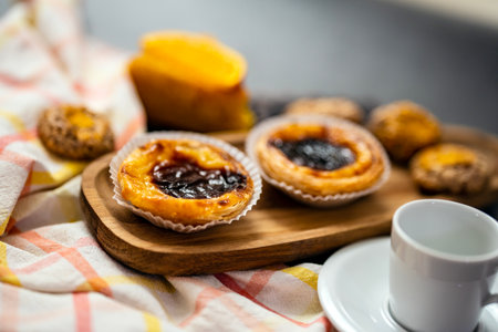 Traditional Portuguese sweets with main focus on famous Pastel de Nata, Faro, Portugal