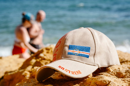 Baseball Cap with Ocean and blurry People in the background, Sal, Cape Verdeの写真素材