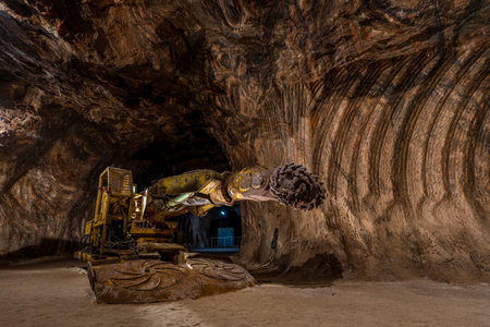 Tunnel boring machine operating inside an underground rocksalt mine in LoulÃ©, Algarve, showcasing...