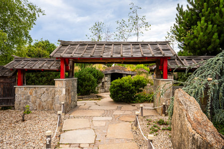 Kapias Botanical Garden in GoczaÅkowice-ZdrÃ³j, Poland, featuring colorful flowers, lush greenery, and serene landscaped pathsの写真素材