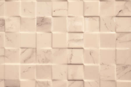 Background in a cold marble look. Vivid picture through a cube-shaped division that is raised