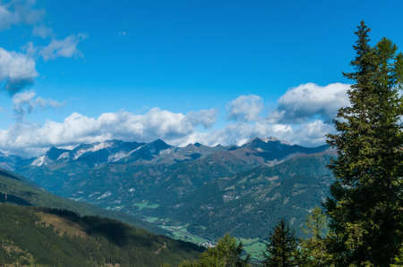 Mountainous landscape in Austria. View from a high point of a mountain rangeの写真素材