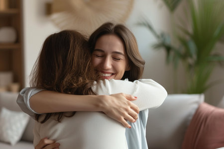 Portrait of happy mother and daughter hugging with AI generated.の素材