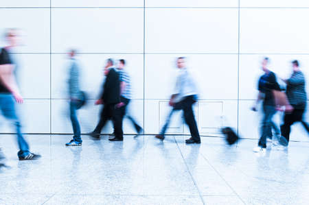 blurred people at a trade fair hallの写真素材