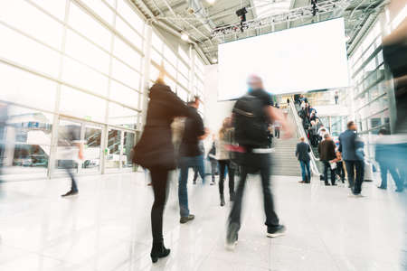 blurred people in a modern hallのeditorial素材