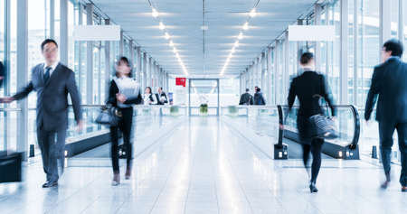 blurred people at a trade fair hallのeditorial素材