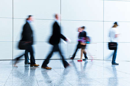 blurred people at a trade fair hallの写真素材