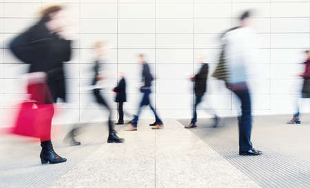 blurred people in a corridorの写真素材