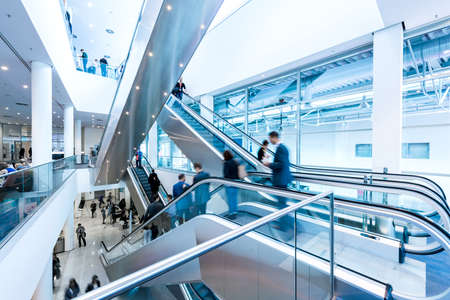 futuristic environment with blurred people business conceptの写真素材