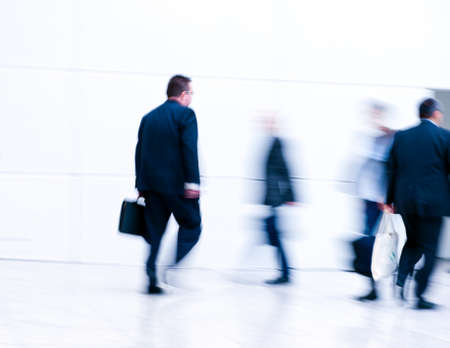 blurred people at a trade fair hallの写真素材