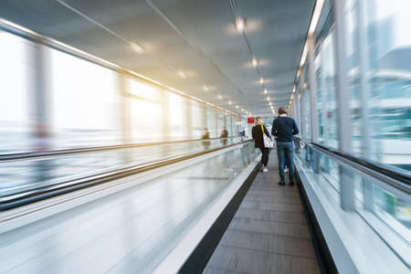 blurred people at a trade fair hallの写真素材