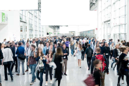 blurred business people at a trade fairの写真素材