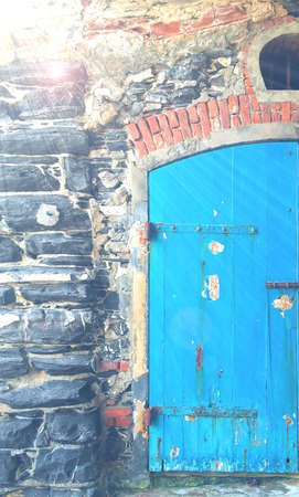 Blue door of a warehouse for boats