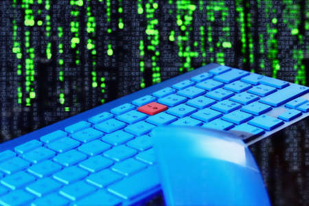 Close up of keyboard, blue light. Red key.Selective focus.  Black and green technologic background....
