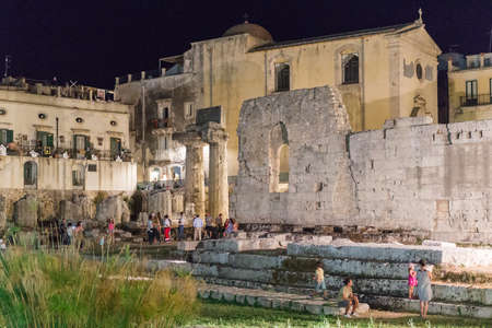 August 24, 2017 - Ortigia (Siracusa) - Italy: Night view of  the Temple of Apollo; It is one of the most important ancient Greek monuments on Ortygia (Syracuse, Sicily, Italy)のeditorial素材