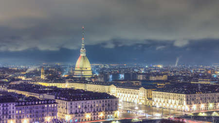 27 December 2018, Turin TO, Italy: View from above of the city of Turin. Mole Antoneliana and Piazza Vittorio in the foreground. At night during Christmasのeditorial素材