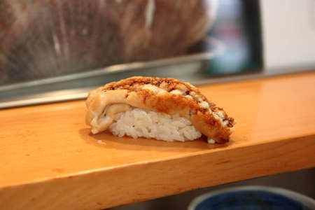 unagi sushi on sushi barの写真素材