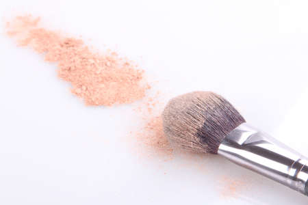 makeup brush and powder isolatedの写真素材
