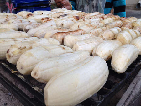 Grilled banana on stove - Thai street foodの素材