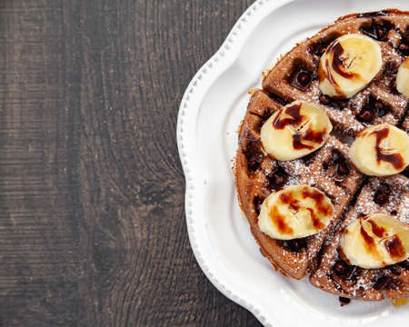 Chocolate banana waffle with caramel sauceの写真素材