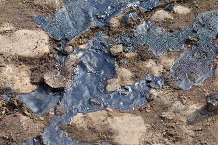 Road covered with melted pitch background