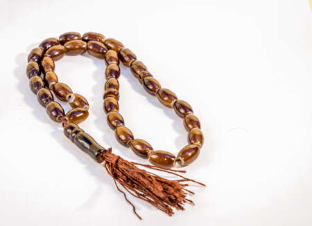 Wooden Capsule Beeds of Tasbeeh isolated against white background