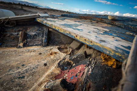 view view from above of the bow of an old fishing boat at the beachの写真素材
