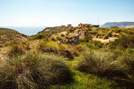 view of ancient ruins on the cliffs of the coast of aguamargaの写真素材
