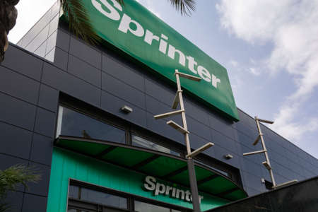 Roquetas de Mar, Spain; September 23th 2021: Bottom-up perspective of a Sprinter sport shop. Low angle view. Nadir plane.のeditorial素材