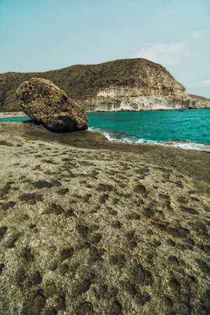 Seascape of a mediterranean rocky coastline turquoise waters with copy space. Enmedio beach. Vacations. Cabo de Gata-Nijar Natural Parkの写真素材