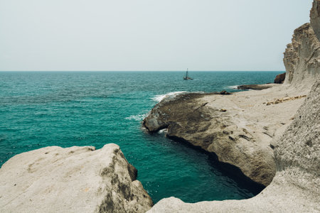 Seascape of a mediterranean rocky coastline turquoise waters with copy space. Enmedio beach. Cabo de...