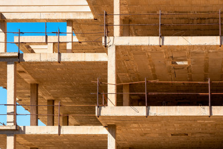 building structure under construction. Columns, concrete, scaffoldingの写真素材