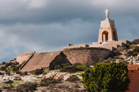 Statue of the sacred heart of Jesus Christ at the top of Saint Cristobal Hillの写真素材