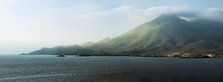 panoramic view of Los Escullos, Almeria, Natural Park Cabo de Gata-Nijar. Mountain and mediterranean seaの写真素材