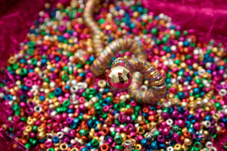 Jewelry snake atop of beadsの写真素材