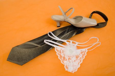 Under Toe - Female Shoe Toe and Panties on Mans Tieの写真素材