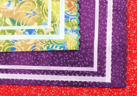Different color and pattern fabrics with ribbon decoration