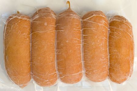 Pack of frozen small sausagesの写真素材