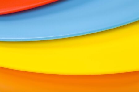 Colorful plastic plates background; close up, macro viewの写真素材