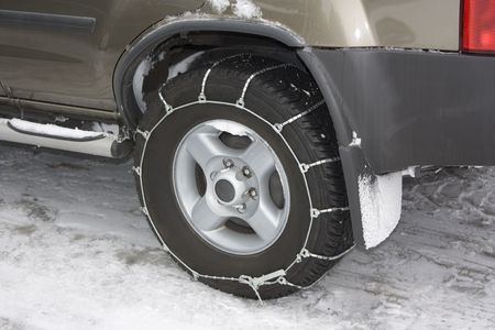 Affixed Metal Snow Chain to Vehicle Tire